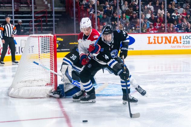 Wenatchee Wild's Gabriel Guilbault battles Spokane Chiefs' Brody Gillespie