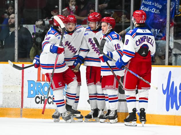 Kitchener Rangers gather following a goal