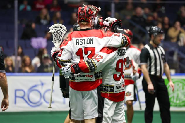Liam Aston of the Ottawa Black Bears receives congratulations after scoring