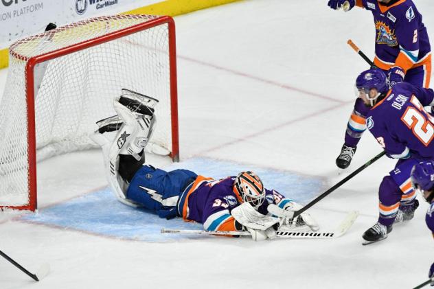 Orlando Solar Bears goaltender Colby Muise sprawls to make a save