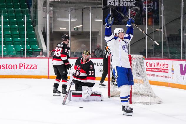 Syracuse Crunch center Dylan Duke reacts after his goal against the Belleville Senators