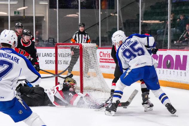 Belleville Senators goaltender Leevi Meriläinen dives to make a save against the Syracuse Crunch