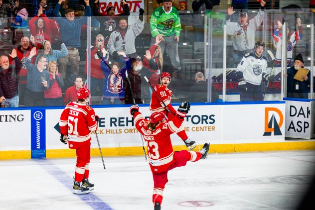 Rapid City Rush's Quinn Olson, Ryan Wagner, and Blake Bennett on game night