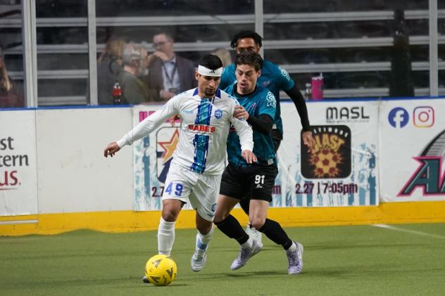 St. Louis Ambush midfielder Randy Martinez (right) vs. Utica City FC