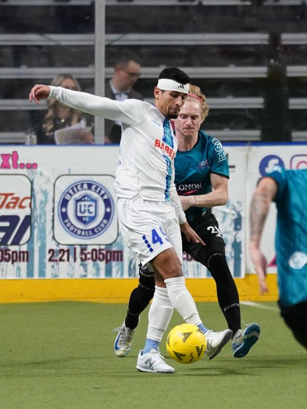 St. Louis Ambush midfielder Colin O'Keefe (right) vs. Utica City FC