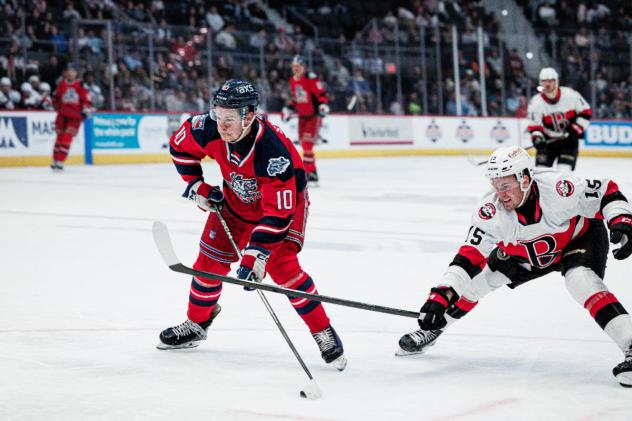 Hartford Wolfpack's Adam Sýkora and Belleville Senators' Olle Lycksell in action