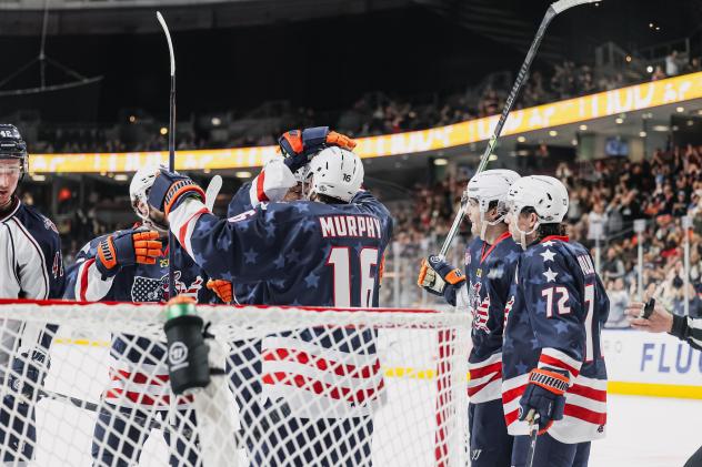 Greenville Swamp Rabbits' Wade Murphy congratulated by team