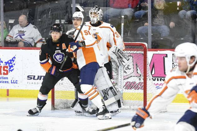 Greenville Swamp Rabbits defenseman Cole Fraser and goaltender Isaiah Saville