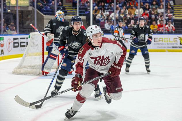 Peterborough Petes centre Adam Levac vs. the Saginaw Spirit