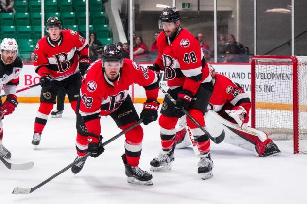 Belleville Senators right wing Hayden Hodgson (left) and defenceman Dennis Gilbert vs. the Utica Comets