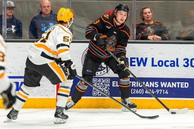 Wheeling Nailers defenseman Brent Johnson (left) eyes the Fort Wayne Komets
