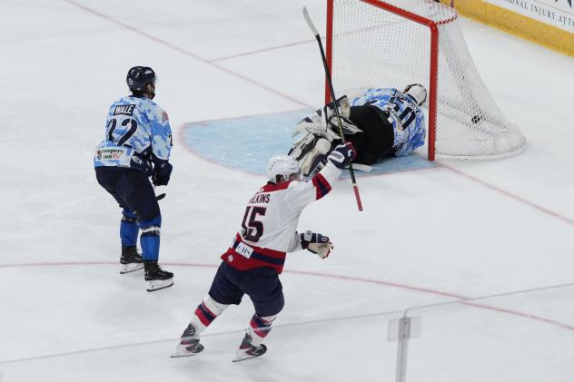 Jacksonville Icemen's Holden Wale and Michael Bullion and South Carolina Stingrays' Josh Wilkins on the ice