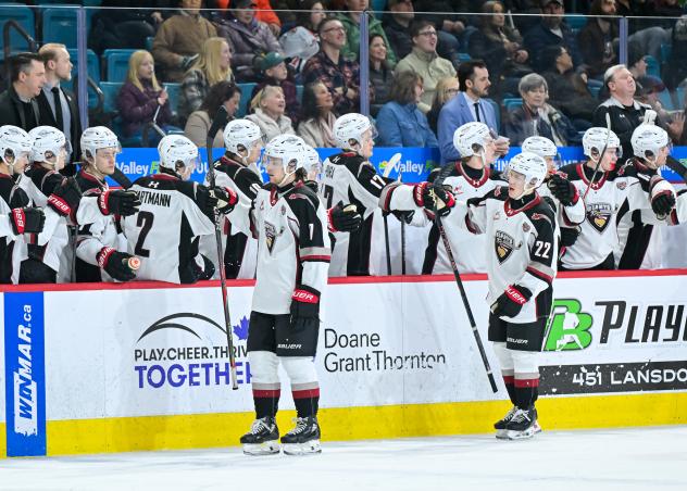 Vancouver Giants' Oliver Bryks and Joe Iginla congratulated by team