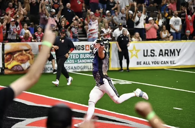 The crowd enjoys a Jacksonville Sharks score