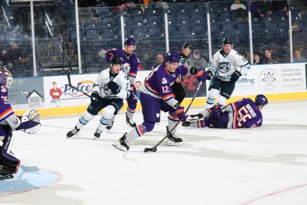 Youngstown Phantoms forward Hunter Bischoff controls the puck against the Madison Capitols