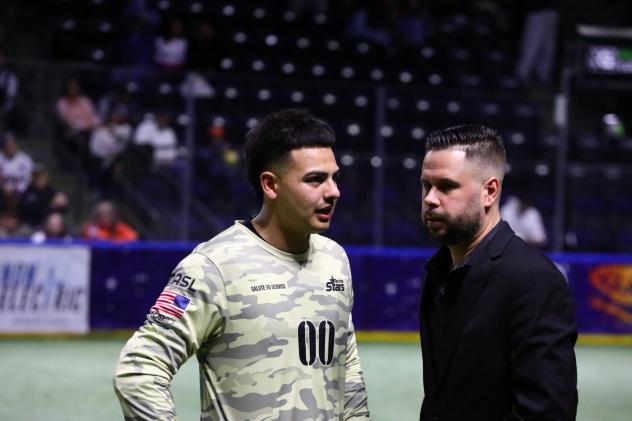 Tacoma Stars goalkeeper Luis Birrueta talks with head coach Adam Becker