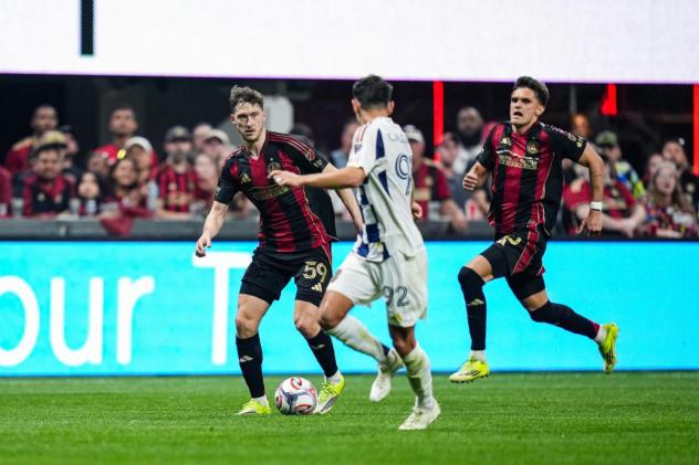 Atlanta United's Alexey Miranchuk and Tomás Jacob and Real Salt Lake's Noel Caliskan in action