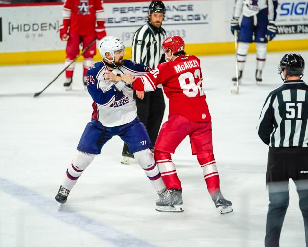 Allen Americans lwft wing Colby McAuley fights with the Tulsa Oilers