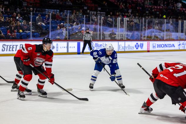 Syracuse Crunch left wing Jakob Pelletier vs. the Utica Comets