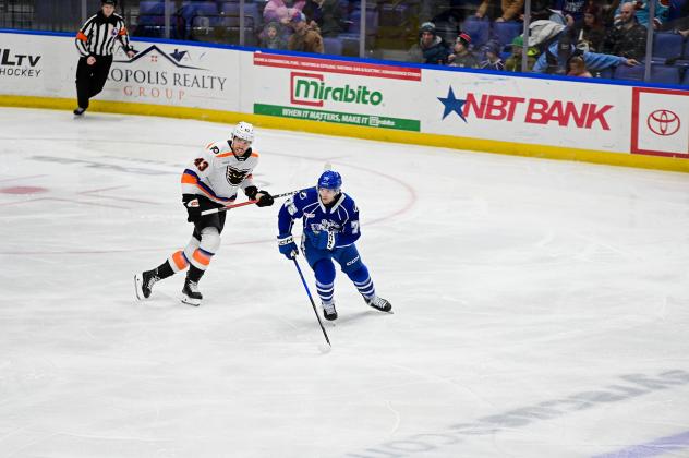 Lehigh Valley Phantoms' Oscar Eklind and Syracuse Crunch's Matteo Pietroniro in action