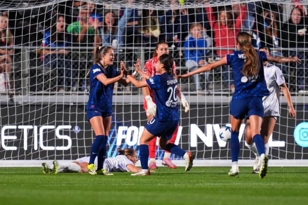 North Carolina Courage congratulate Ashley Sanchez (left) after her first goal
