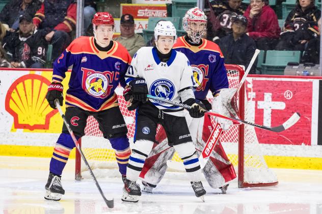 Wenatchee Wild's Levi Benson and Prince George Cougars' Bauer Dumanski and Alexander Levshyn