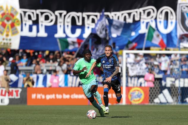 San Jose Earthquakes forward Benji Kikanović (right) vs. Seattle Sounders FC