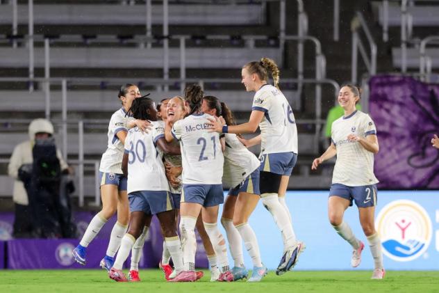 Seattle Reign FC mobs Brittany Ratcliffe following her goal