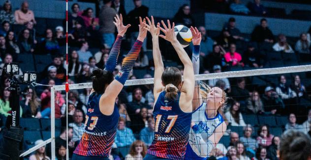 Grand Rapids Rise outside hitter Paige Briggs-Romine (left) and middle blocker Alyssa Jensen