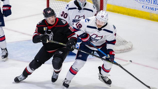Adirondack Thunder forward Grant Loven (left) vs. the Kalamazoo Wings