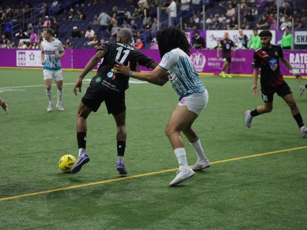 St. Louis Ambush defender Robert Williamson (right) vs. the Empire Strykers