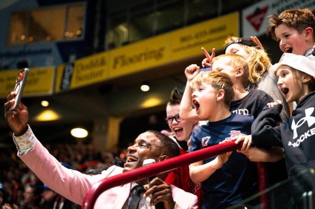 Young Oshawa Firewolves fans cheer on the team