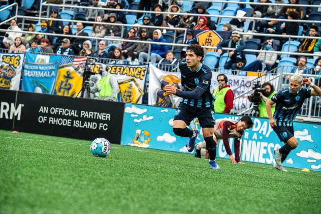Rhode Island FC forward Leo Afonso races to the ball