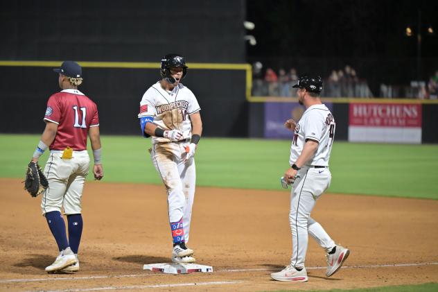 Fayetteville Woodpeckers' Kevin Alvarez and Tanner Montgomery and Wilson Warbirds' Frederi Montero on game night