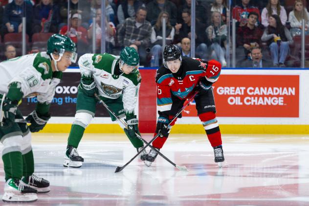 Kelowna Rockets right wing Carson Wetsch (right) vs. the Everett Silvertips
