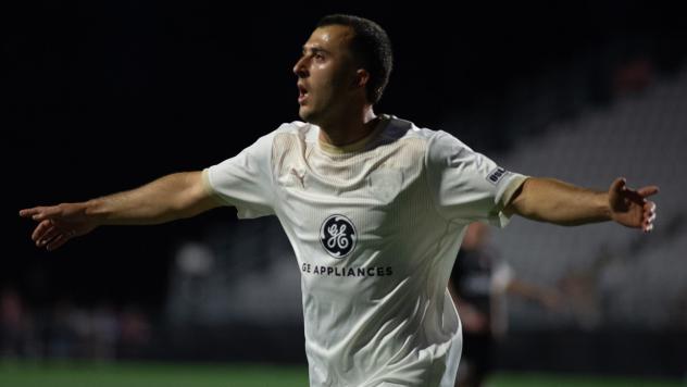 Louisville City FC reacts after a goal against Loudoun United FC