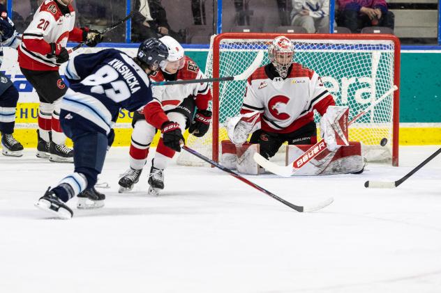 Penticton Vees' Jacob Kvasnicka and Prince George Cougars' Joshua Ravensbergen on game night