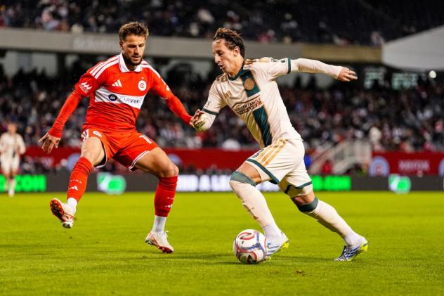 Chicago Fire FC's Philip Zinckernagel and Atlanta United's Matías Galarza in action