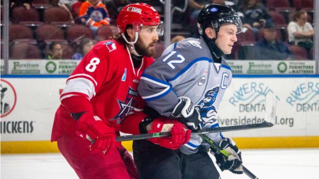 Wichita Thunder forward Peter Bates (right) vs. the Allen Americans