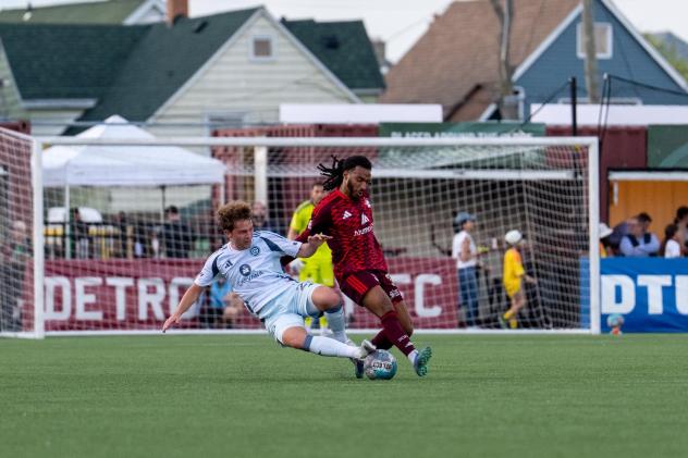 Detroit City FC defender Devon Amoo-Mensah (right) vs. the Chicago Fire
