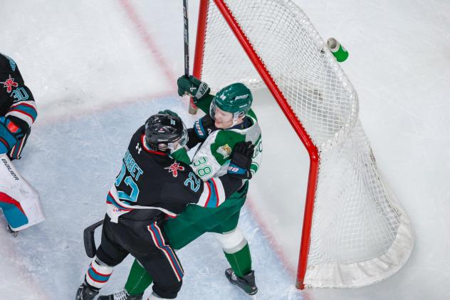 Kelowna Rockets defenceman Nate Corbet battles the Everett Silvertips