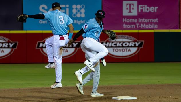 Hickory Crawdads celebrate in the field