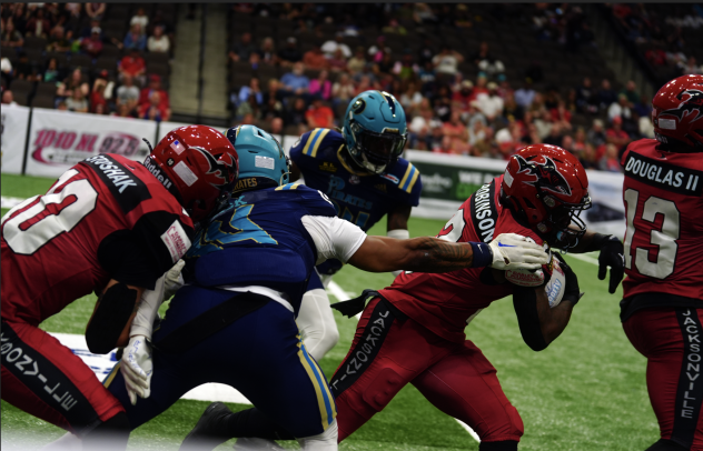 Jacksonville Sharks running back Jimmie Robinson Jr. carries vs. the Orlando Pirates