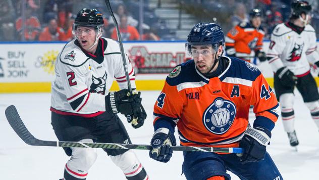 Adirondack Thunder defenseman Mitchell Becker (left) vs. the Worcester Railers