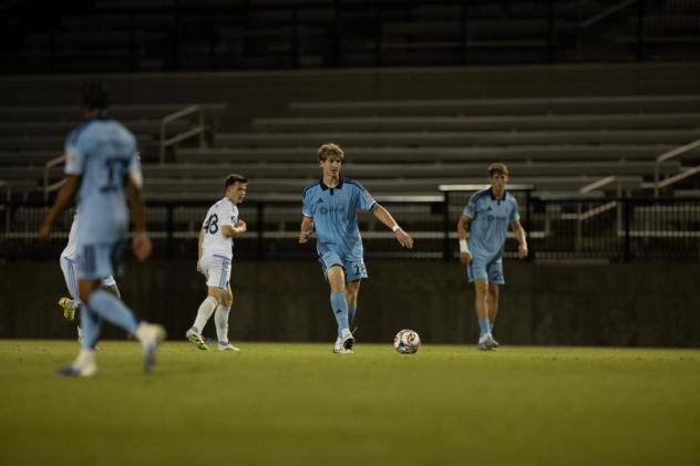 Chattanooga FC midfielder Luke Husakiwsky with possession vs. Crown Legacy