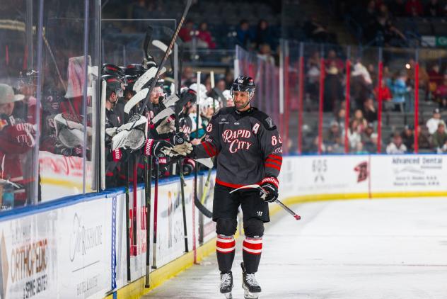 Rapid City Rush's Garrett Klotz congratulated by team