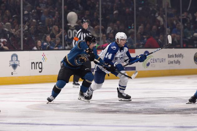 Syracuse Crunch forward Tristan Allard (right) against the Cleveland Monsters