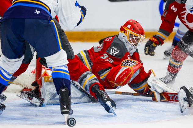 Ottawa Charge goaltender Gwyneth Philips pounces on a loose puck