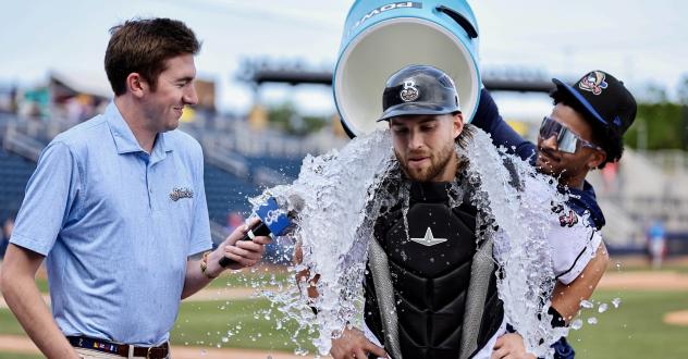 Biloxi Shuckers catcher Matthew Wood gets doused