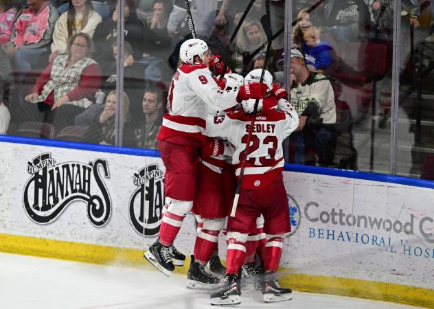 Allen Americans mob Colby McAuley after his game-winning goal